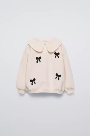 SWEATSHIRT WITH BOW APPLIQUÉS